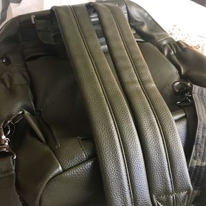 Lug faux vegan leather purse (gold) and olive green backpack